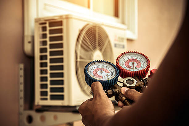 Professional Hvac technician working in Old Monroe, MO